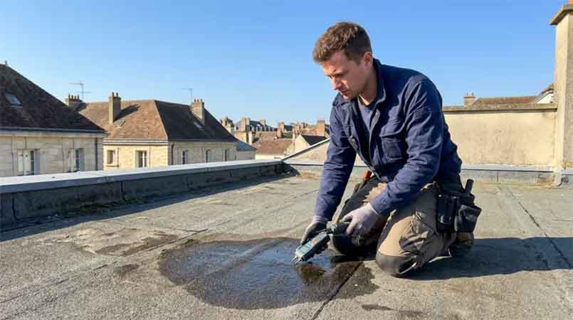Réalisation de réparation d'infiltration de toit-terrasse 6